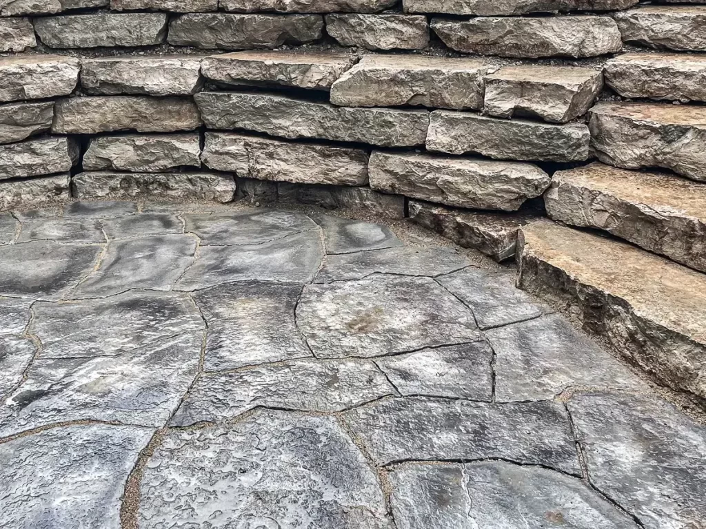 retaining wall made with limestone stacked stone